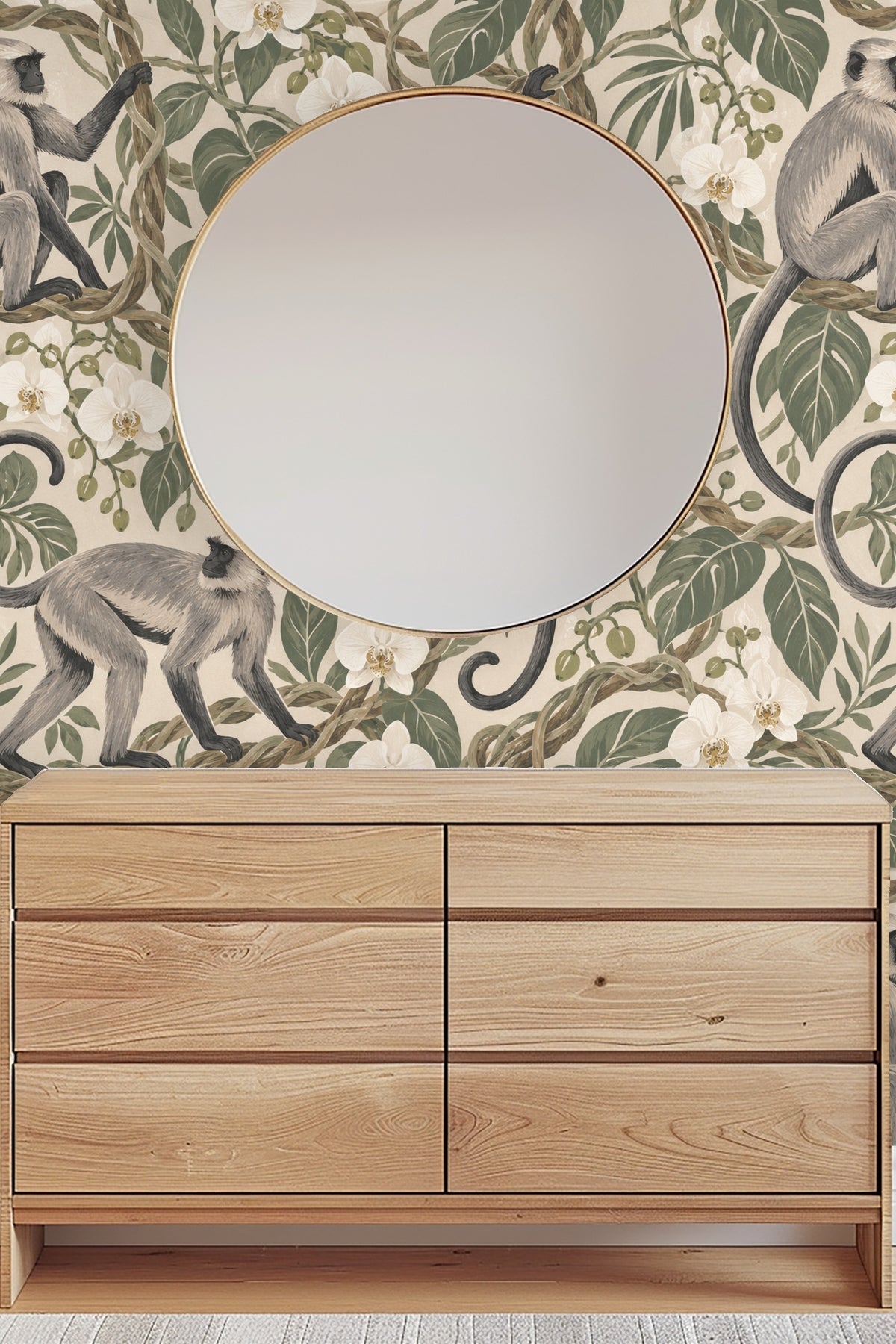 Wall section behind wooden shelves displaying paper with playful langurs and botanical motifs.