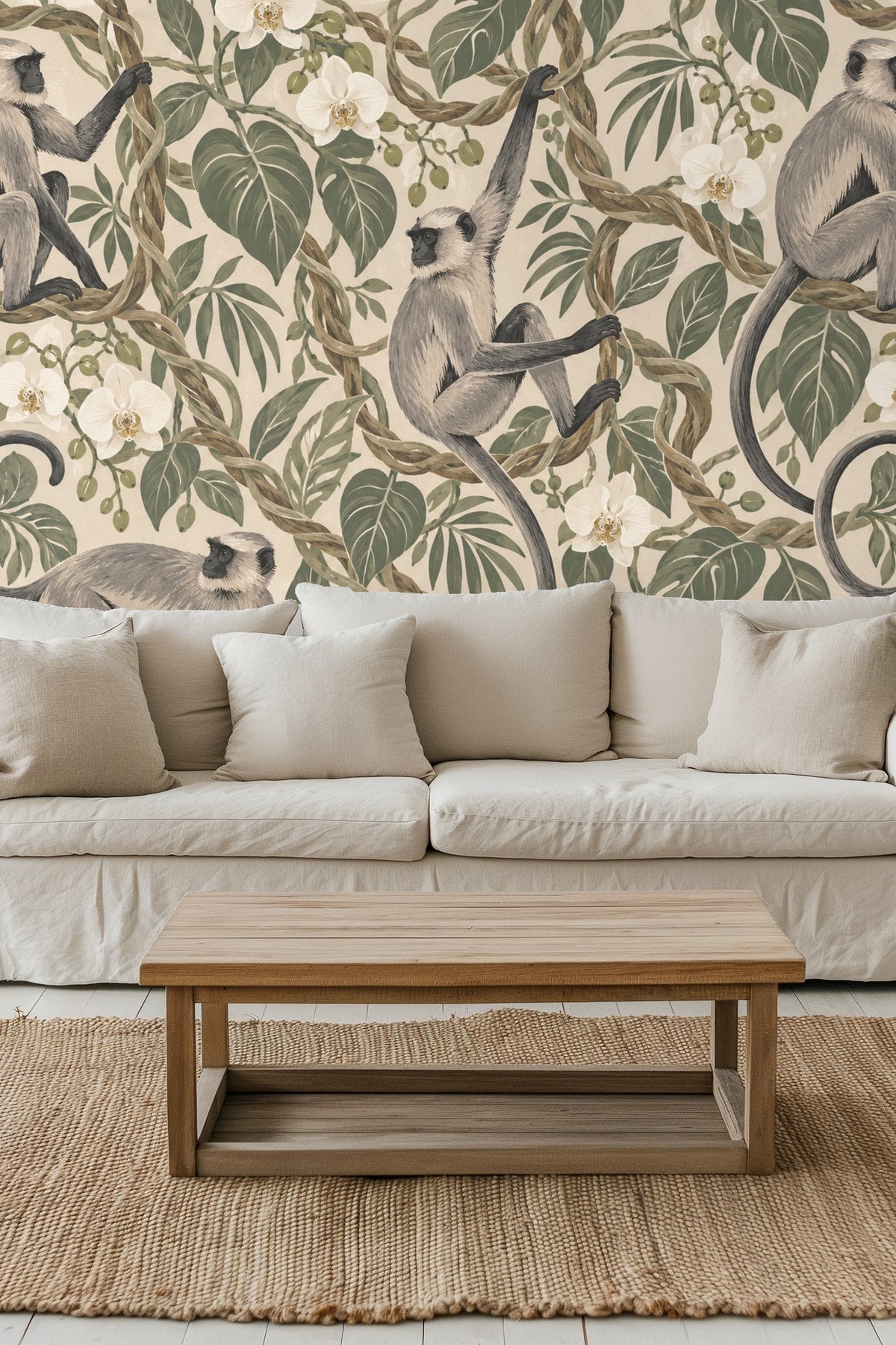 Section of wallpaper showing langur sitting with curled tail wrapped around vine, amidst large leaves and white flowers.