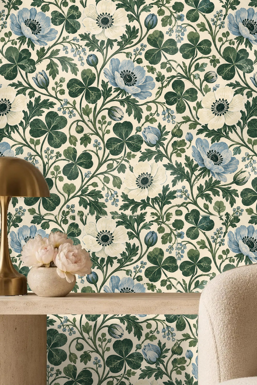 Partial view of wallpaper pattern showing flower buds and green leaves.