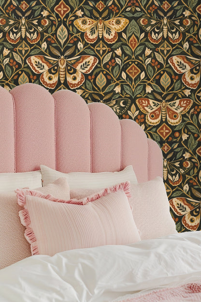 Green bed framed by paint and textile inspiration with wallpaper backdrop