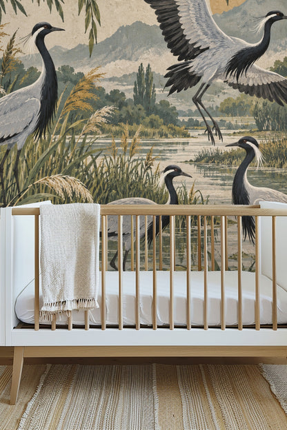 Willow tree branches framing the crane mural in soft green hues