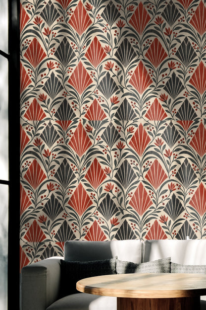 Tall floral motifs with curling leaves and berries on crimson and black patterned wallpaper