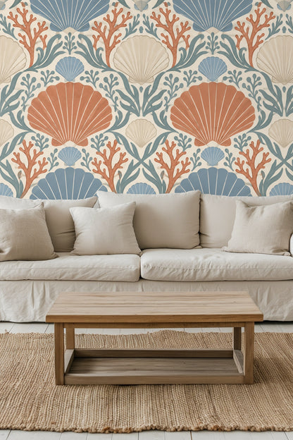 Coral Cove Crest wallpaper repeat pattern showing scallop shells and coral branches in terracotta, blue, and cream.