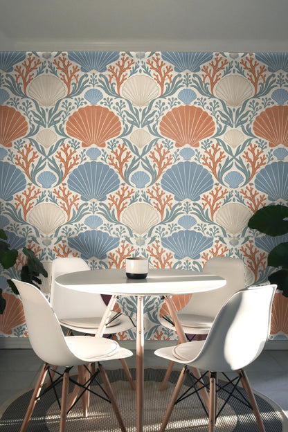 Coral Cove Crest wallpaper pattern showing layering effect of sea motifs over cream background.
