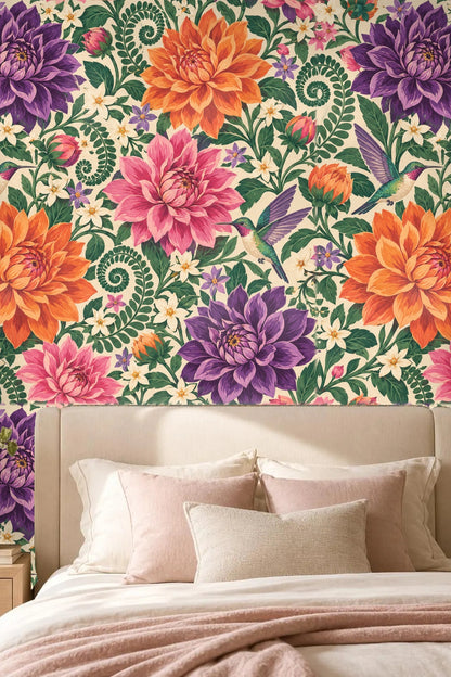 Living room featuring wall covered in vibrant dahlia wallpaper behind modern white sofa and orange chair