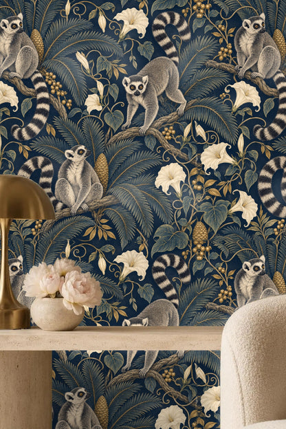 Section of wallpaper illustrating lemur poses with climbing and sitting postures amid curling vines and large leaves.