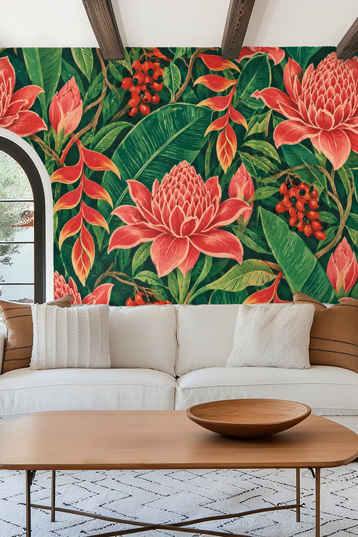Bedroom wall showcasing the bold tropical wallpaper behind a beige upholstered bed with soft pillows