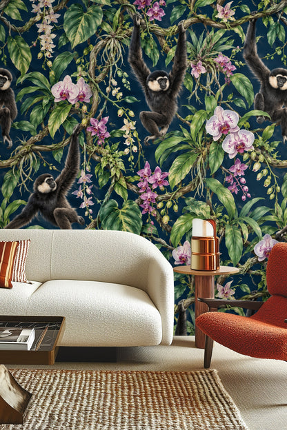Wallpaper pattern showing detailed gibbons swinging among orchid blossoms and green leaves against navy blue background