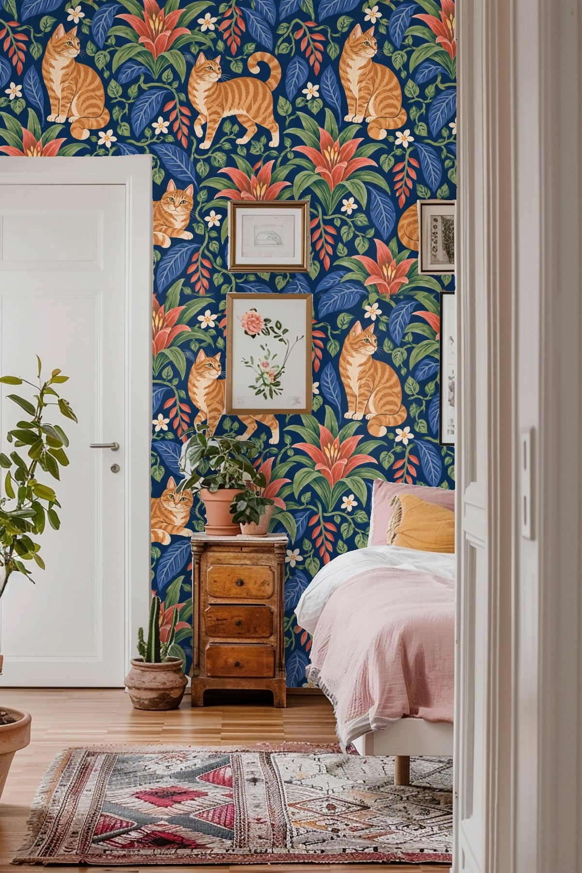 Large scale wallpaper section showing bold bromeliad blooms and textured leaves