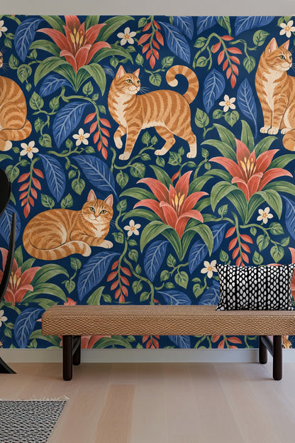 Three ginger tabby cats in various poses layered with bromeliad flowers and vines