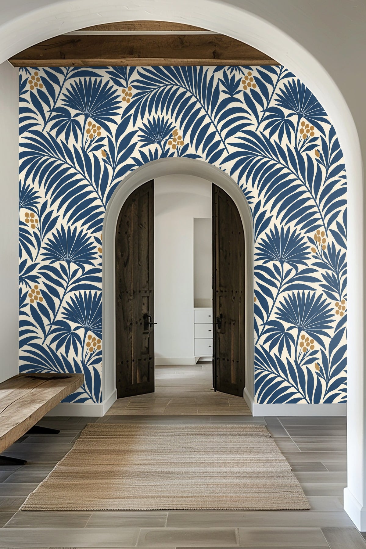 Indigo Fan Palm wallpaper with a brass towel ring and a white towel in a bathroom setting