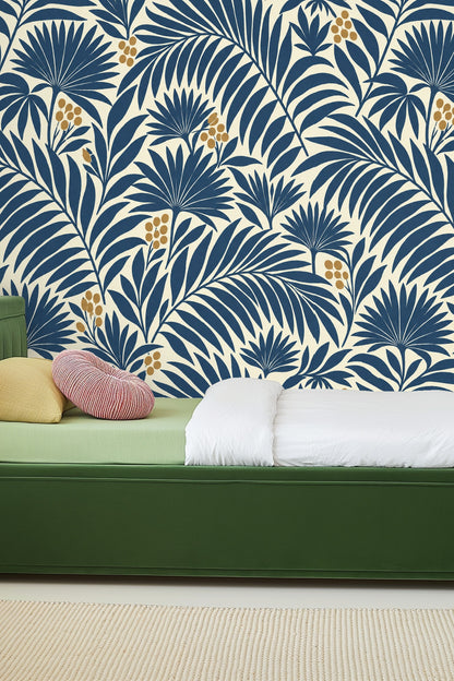 Stylized palm leaf branches creating a repeating pattern in indigo and gold