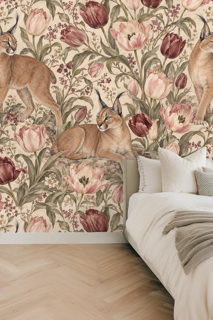 Close-up detail of lynx with tufted ears against tulip blossoms