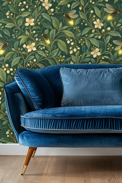 Wallpaper pattern of green leaves, white blossoms, and glowing fireflies on a teal background