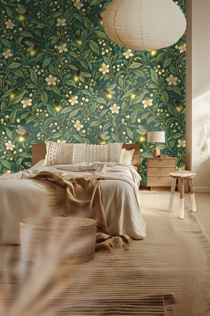 Branch with clusters of white flowers and ripe green berries on wallpaper