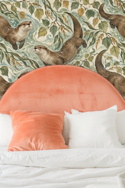 Living room corner with wallpaper showcasing woodland elements and aquatic animals in calming colors.