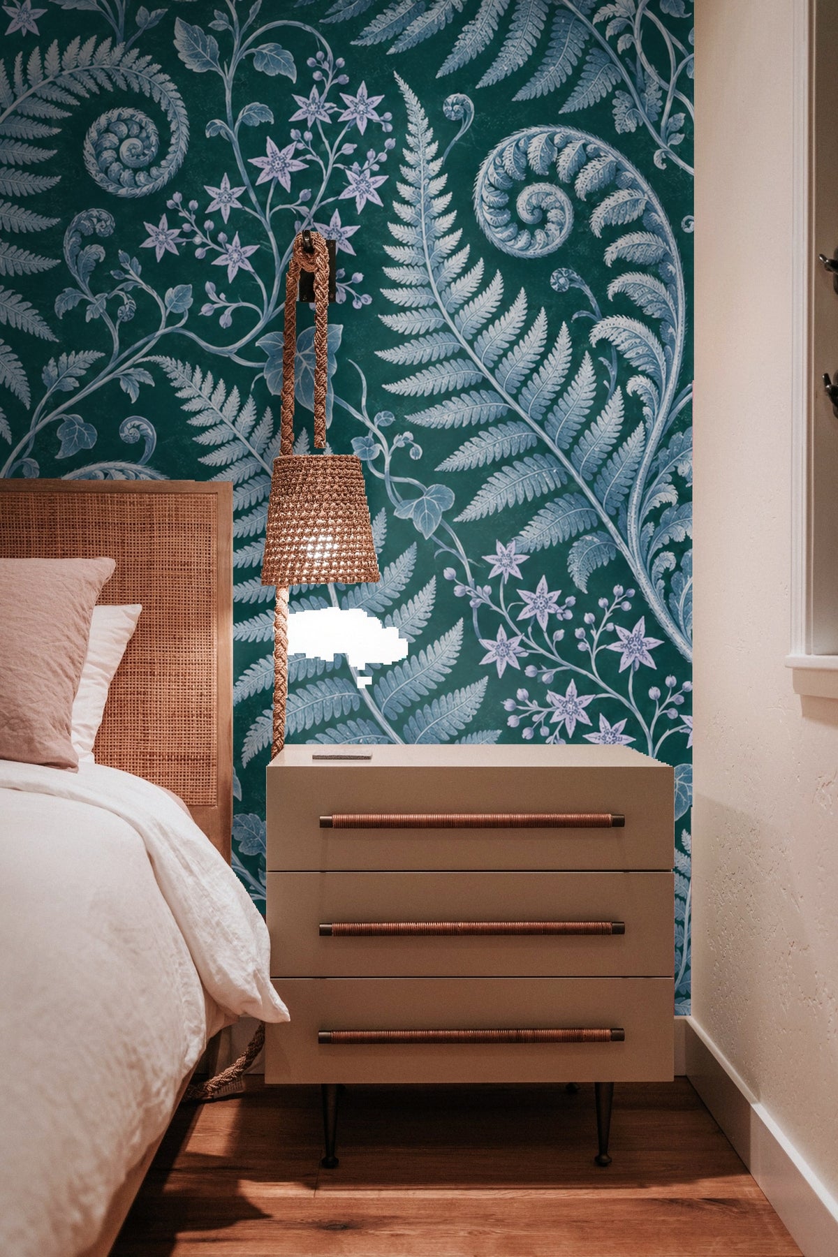 Wall showing interplay of large fern leaves and curling tendrils in vintage botanical style