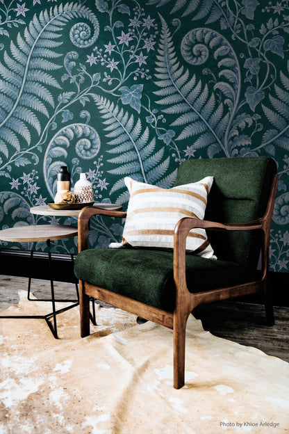 Pattern repeat showcasing intertwined ferns and flowers in cool tones