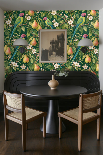 Branch with parakeet perched alongside hanging pears on wallpaper