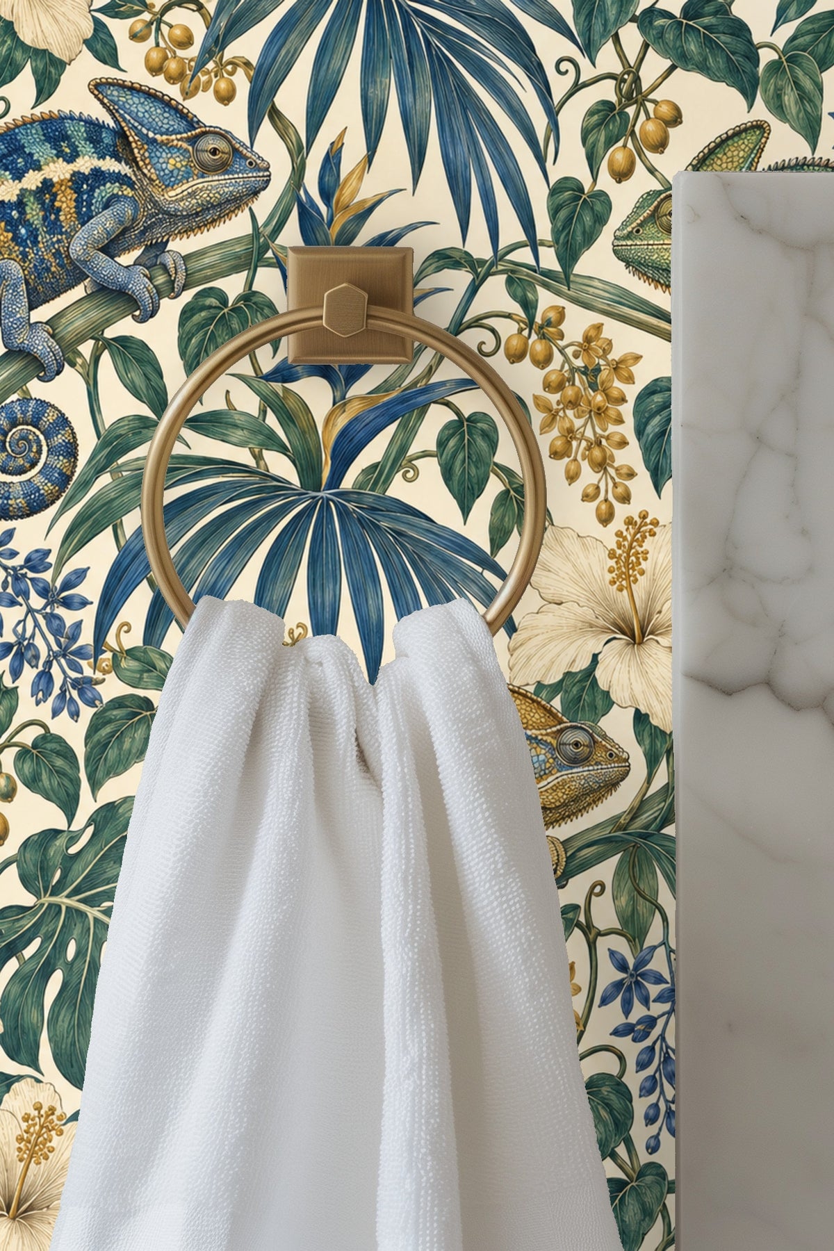Wallpapered entryway wall showing Ultramarine Palm Chameleons design behind textured cabinetry and framed art