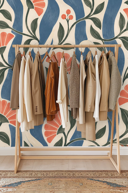 Section of wallpaper with twisting green stems, leaves, and coral flowers