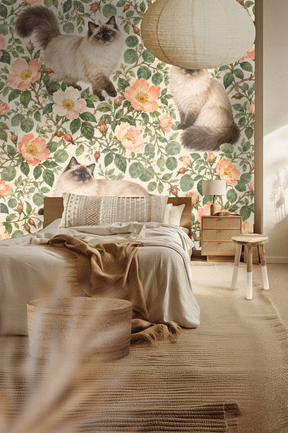 Living room scene featuring Dayrose Ragdolls wallpaper behind a round wood table and modern sofa