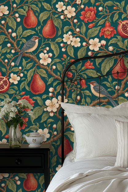 Branch with blooming flowers and ripe pears on wallpaper surface.
