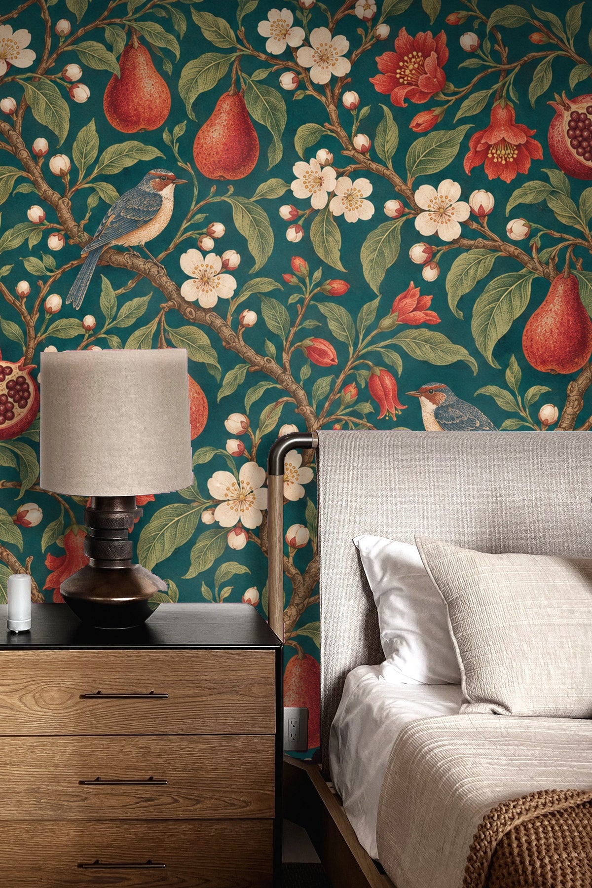 Peach-colored upholstered curved headboard with wallpaper backdrop.