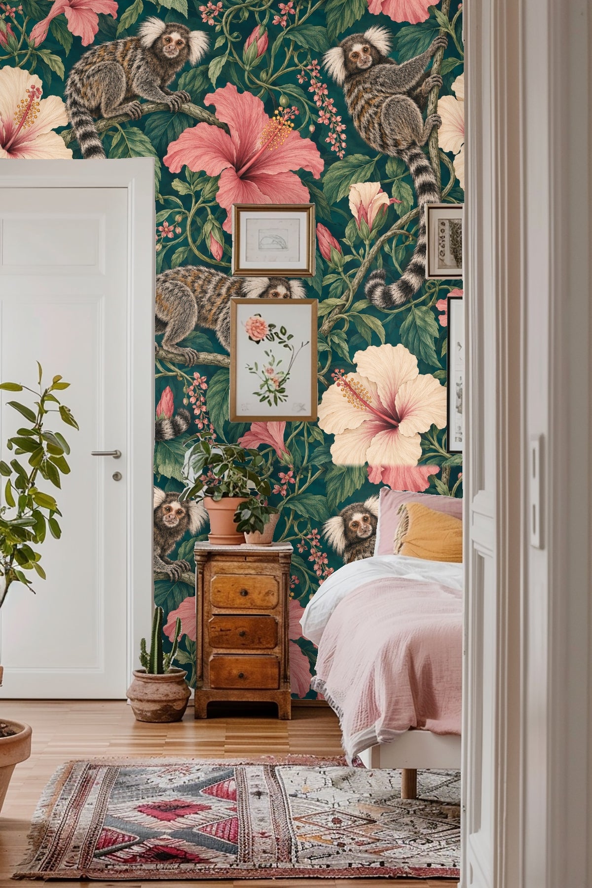 Cluster of large pink hibiscus flowers with intertwined vines on wallpaper