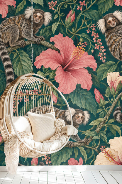Living room with orange sofa against wallpaper of petrol hibiscus and marmosets