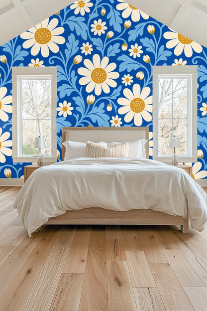 Wallpaper artwork showing bold cerulean blue background with creamy white daisies and mustard centers with blue leaves
