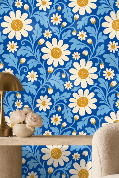 Wallpaper sample with overlapping floral elements and rich blue base