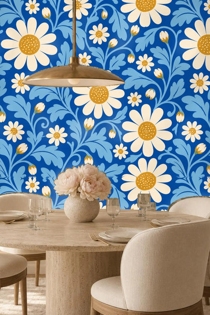 Blue leaves curling in folk art style with daisy buds on wallpaper