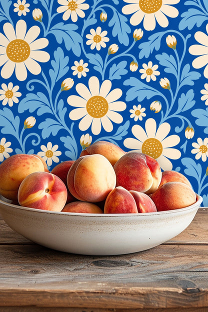Pattern repeat of white daisy heads with mustard centers on blue background
