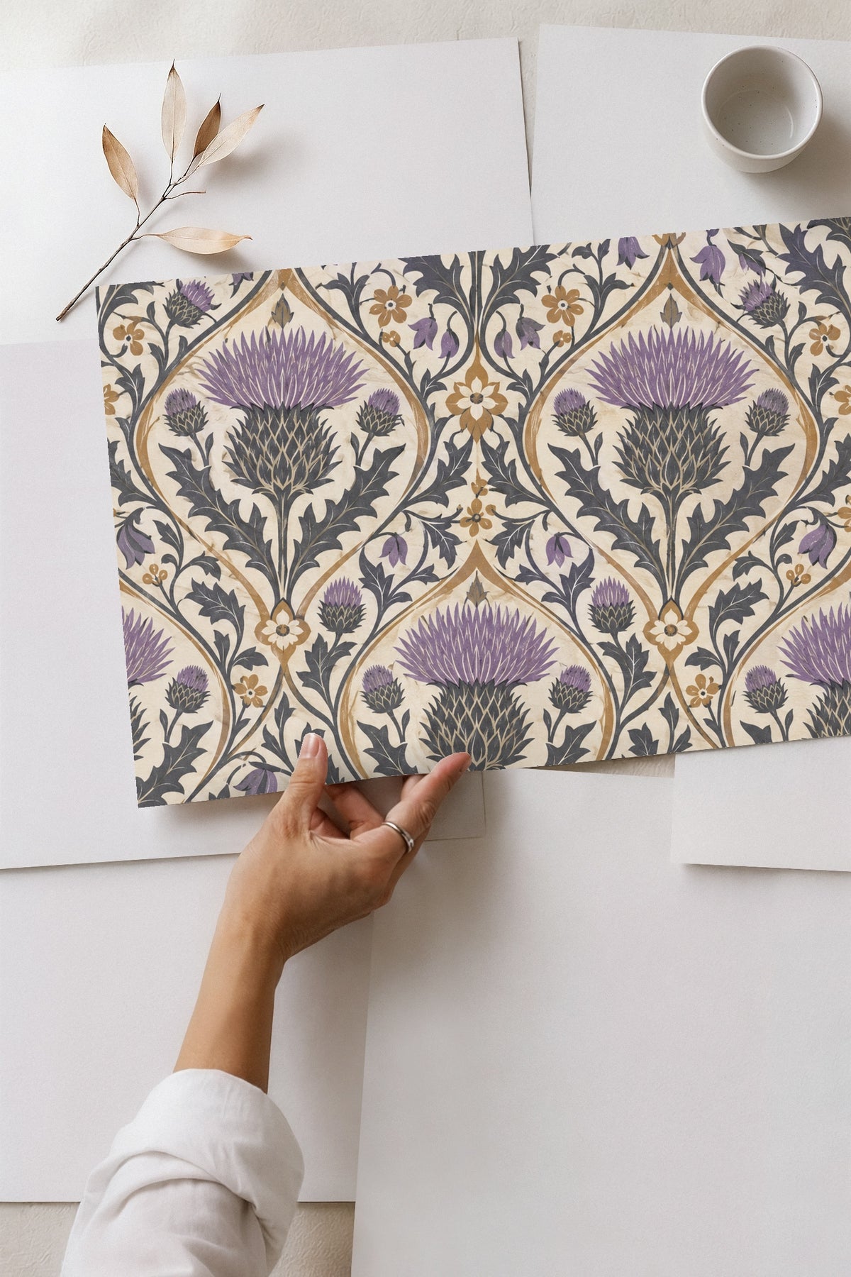 Floral pattern with symmetrical medallion shapes in muted colors