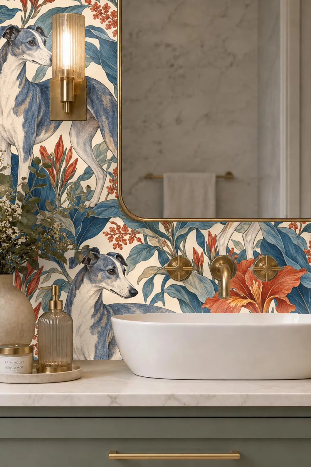 Blue foliage and terracotta flowers surround a whippet lying down