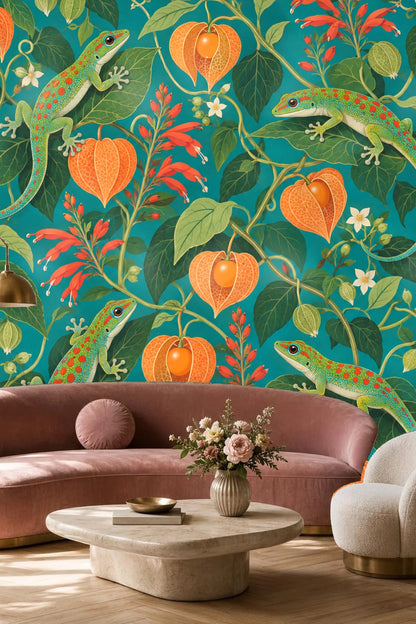 Bedroom wall covered in wallpaper showing green geckos and coral gooseberries behind green bed frame