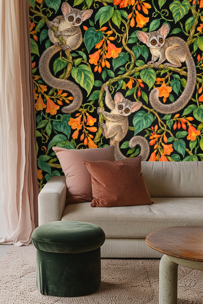 Bedroom wall featuring Tangerine Galago Vines wallpaper behind peach-colored velvet headboard and white bedding.