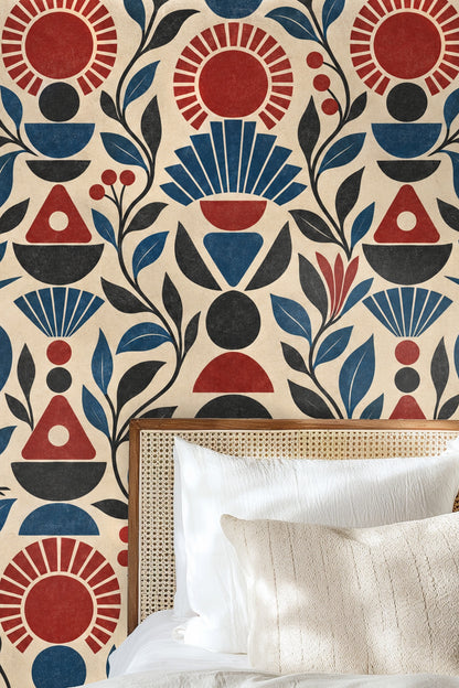 Close-up of the ruby red sun motif with radiating lines in Ruby Sunstack wallpaper