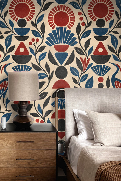 Living room featuring Ruby Sunstack wallpaper behind a curved white sofa and orange armchair