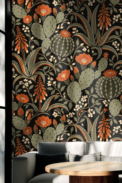 Pattern repeat of stylized desert plants with sharp outlines and painterly details in muted green and orange