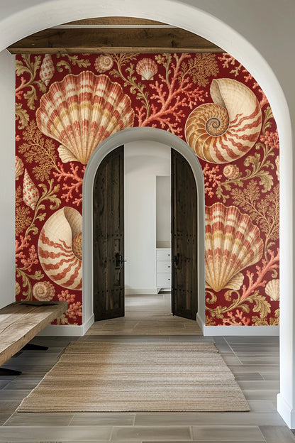 Nautilus shell detail against a claret red wallpaper backdrop.