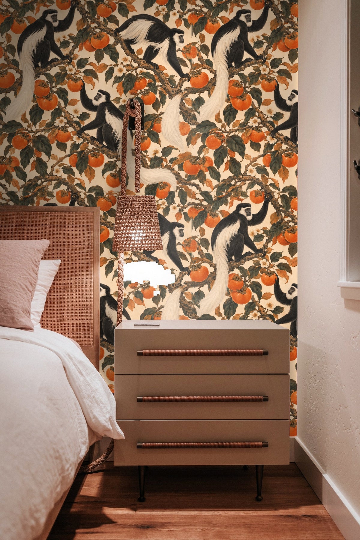 Pattern repeat detail showing monkey tails and clusters of orange persimmons