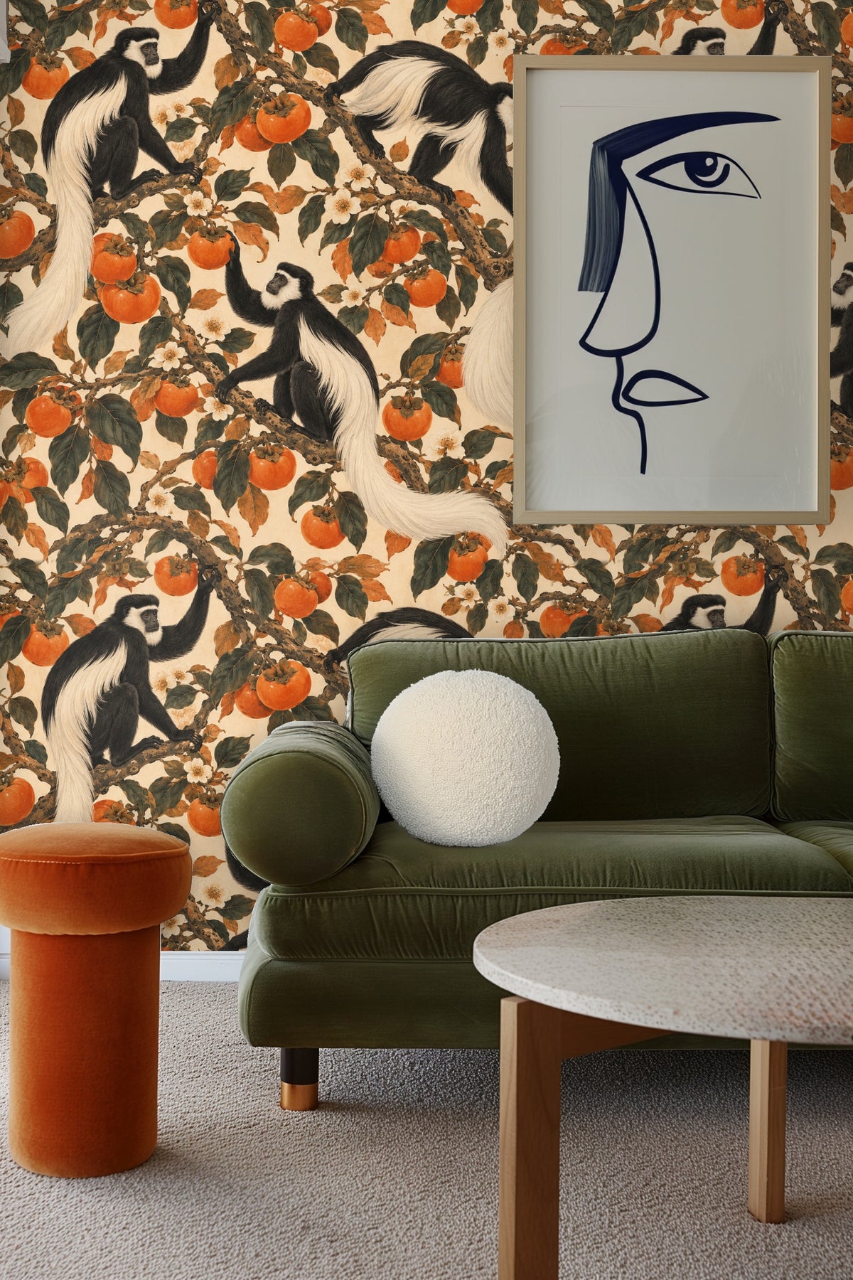 Interior room with Persimmon Colobus Swing wallpaper behind a white textured sofa and rustic decor