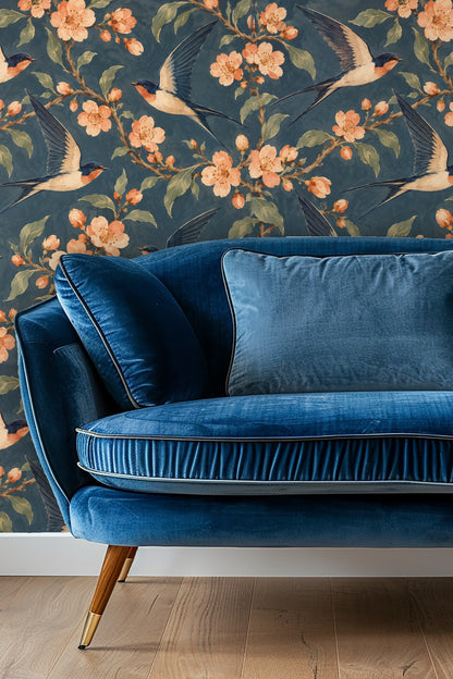Wallpaper pattern with apricot blossoms and flying swallows on blue background