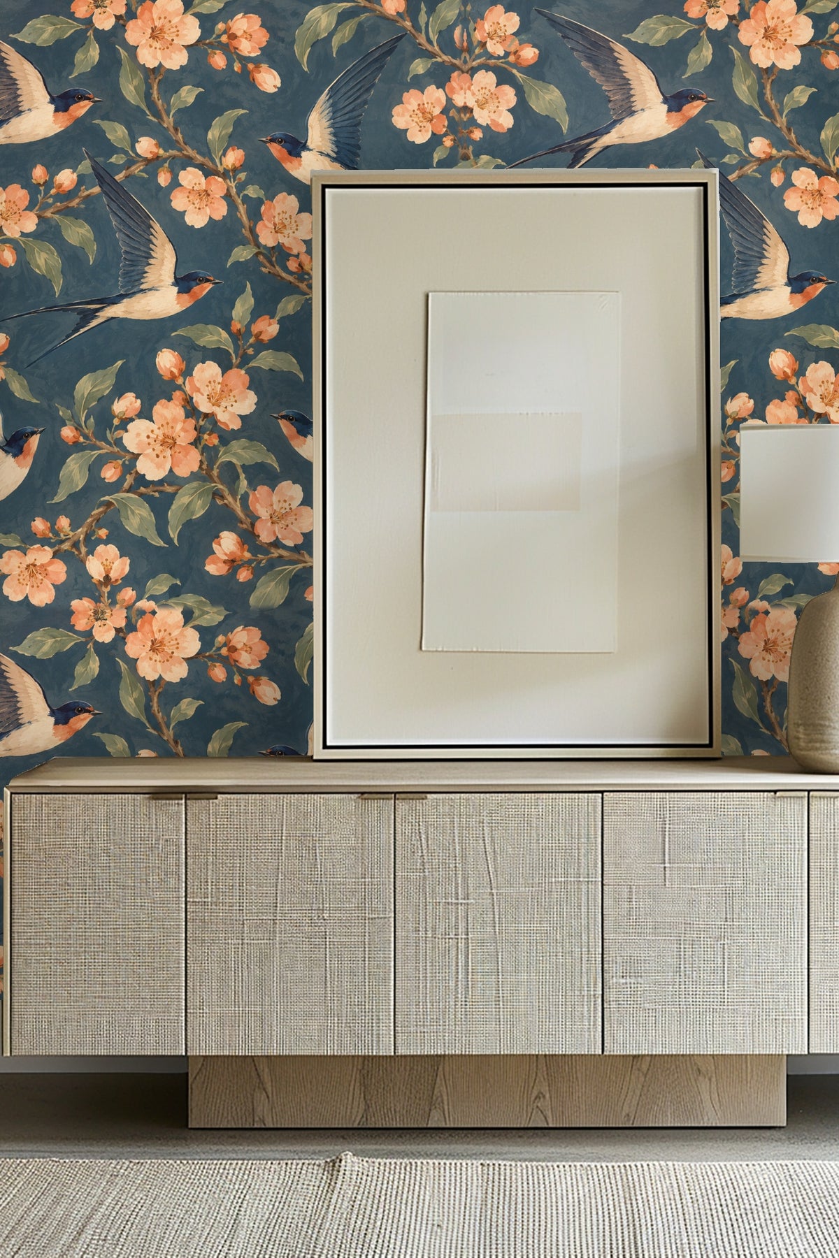 Laundry room with wooden counter, white washer/dryer, and floral swallow wallpaper