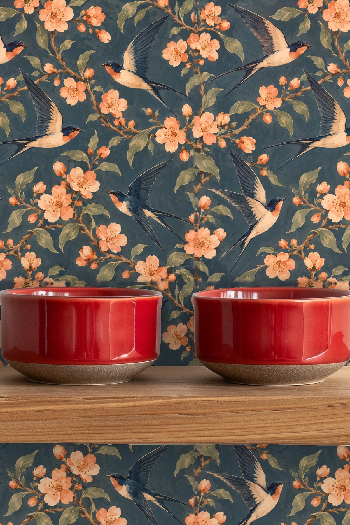 Wallpaper shown behind plush blue sofa with piping detail