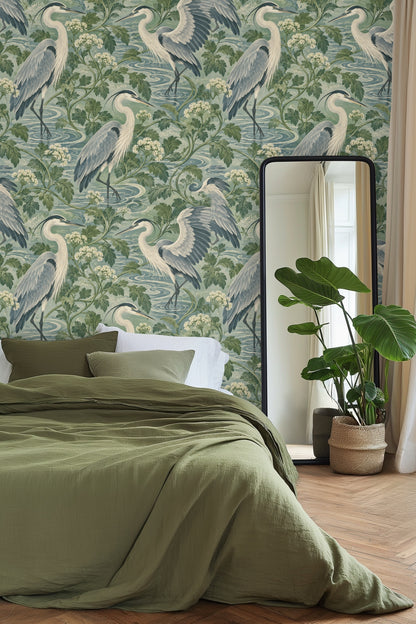 White flowers and dark green leaves framing herons in wallpaper.
