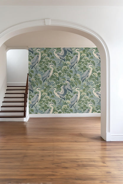 Artful depiction of multiple herons wading through water in wallpaper design.