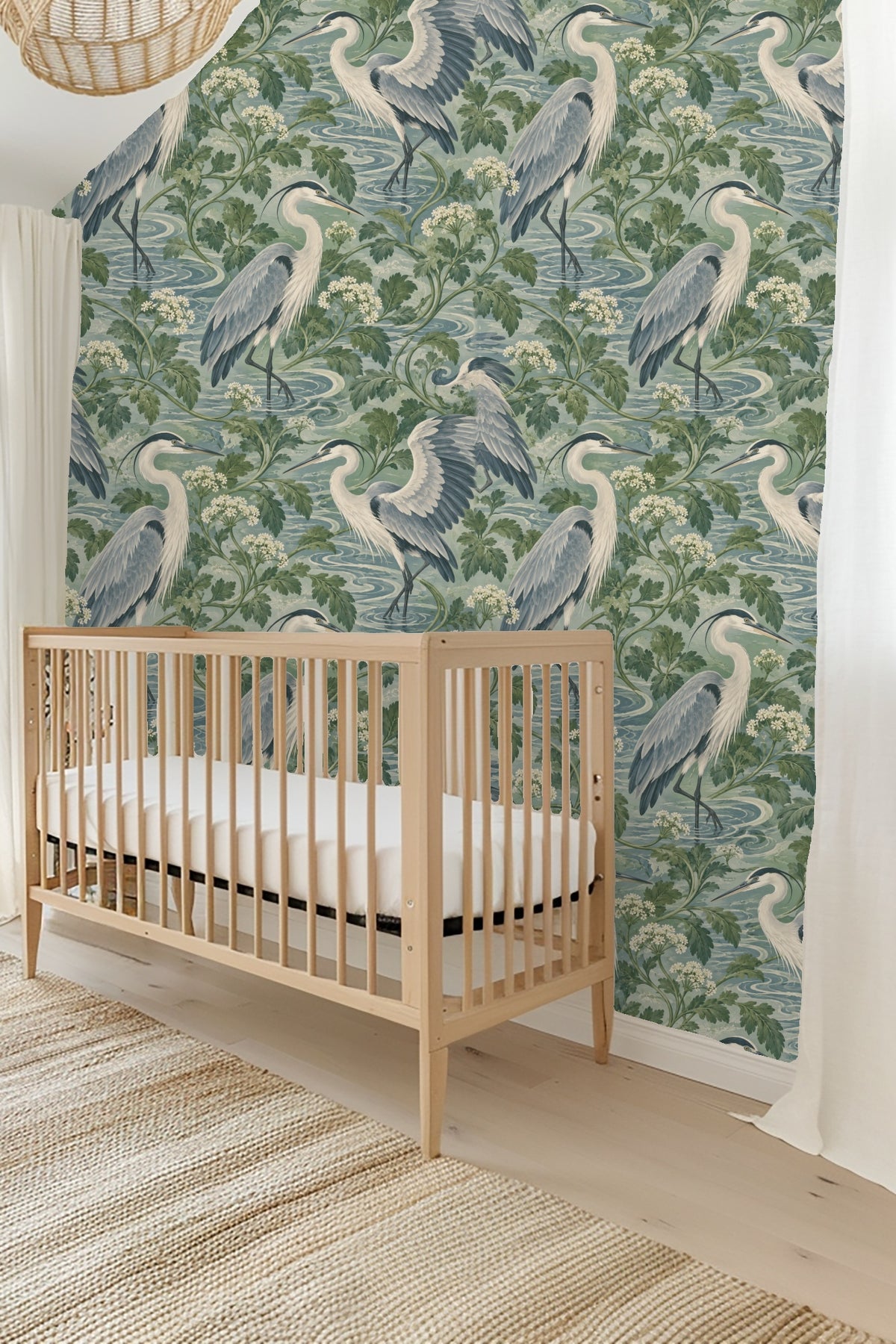 Living room with arched window and Celadon Heron Loops wallpaper on feature wall.